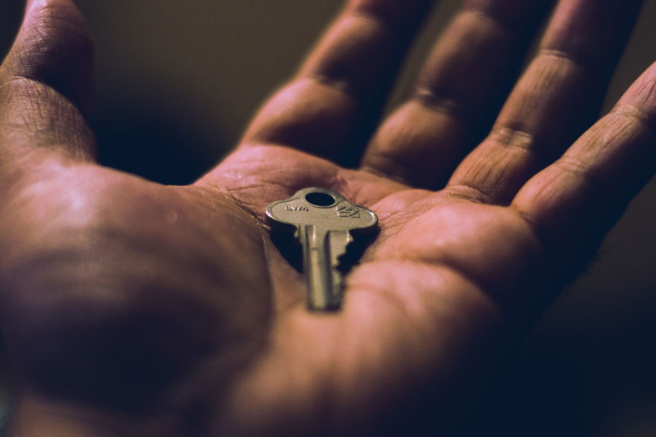 A person holding a key