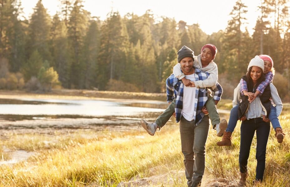 A family hiking in the woods.