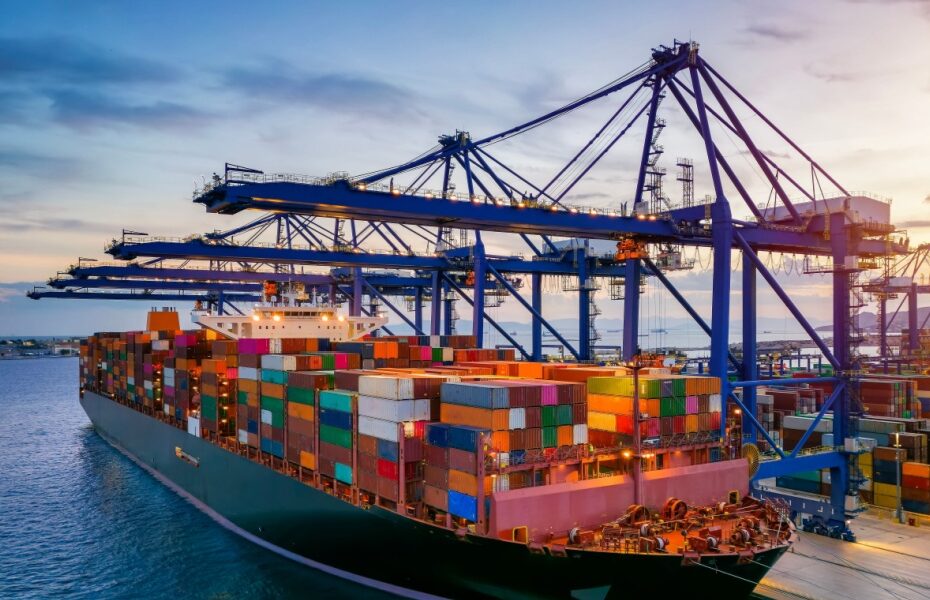A container cargo ship at a commercial dock.