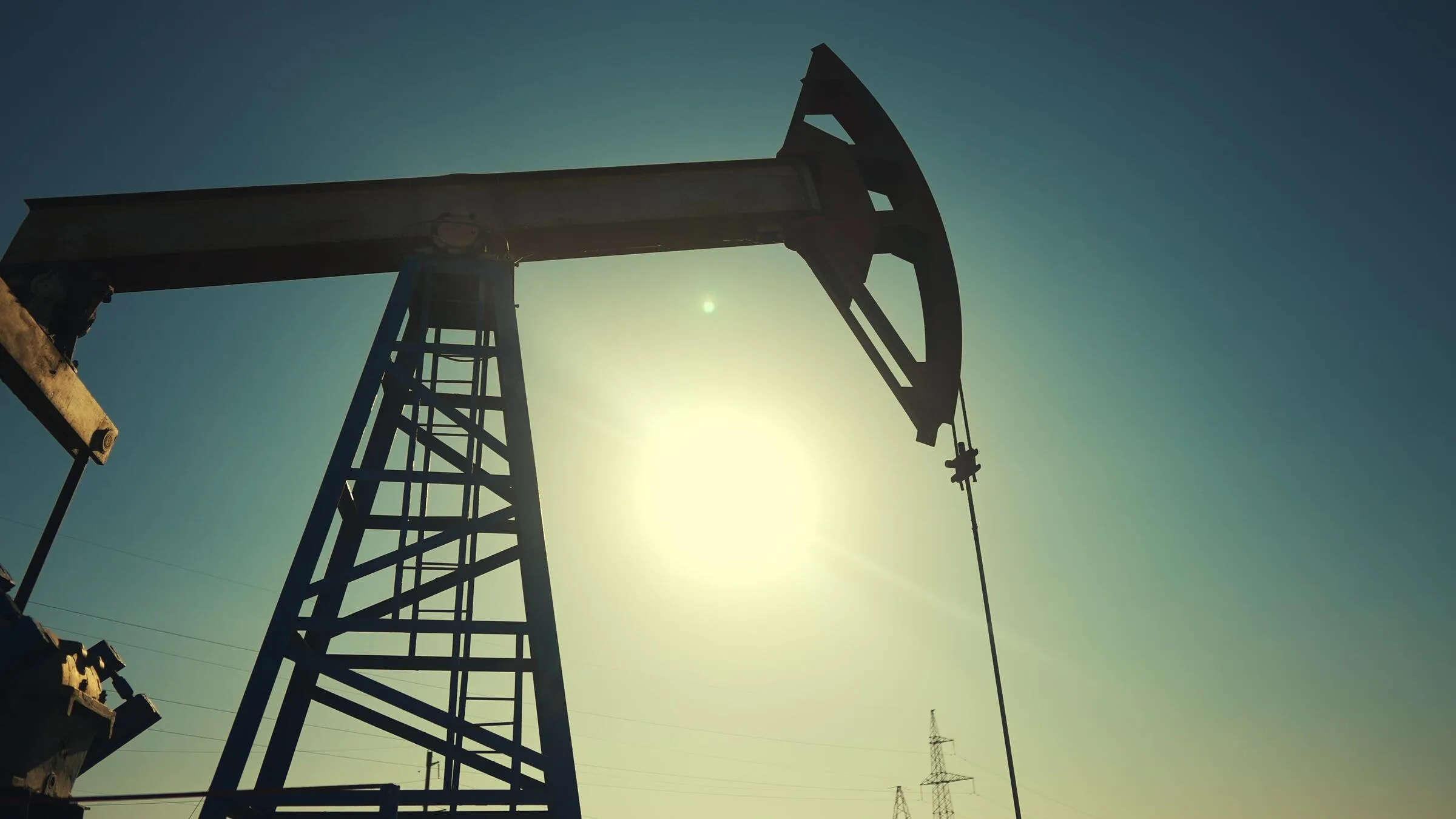 A silhouette of an oil pump.